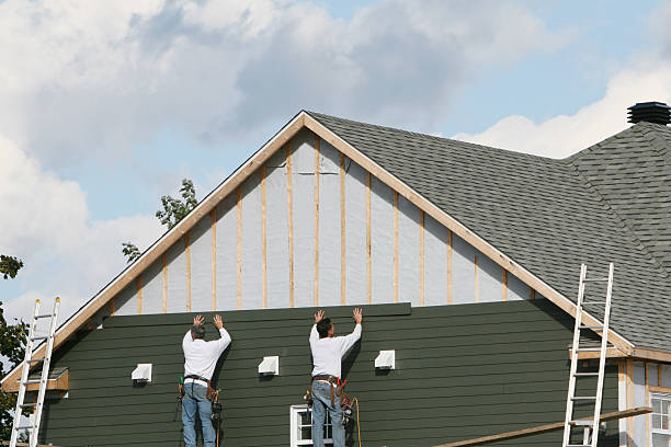 Professional Siding Installation technician working in Dobson, NC